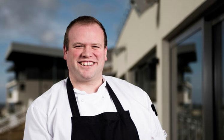 Jon Williams, the new head chef at Bath Racecourse posing for a photo.