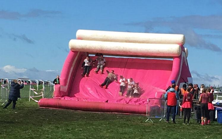 Inflatable obstacle set up at Bath Racecourse for a charity run.