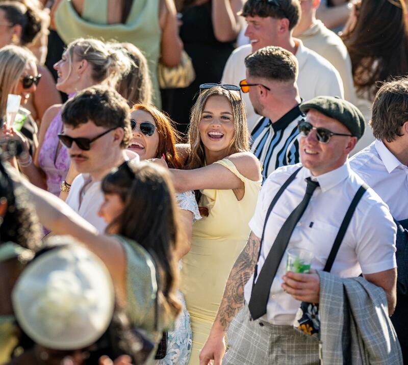 A shot of the crowd enjoying entertainment at Bath Races