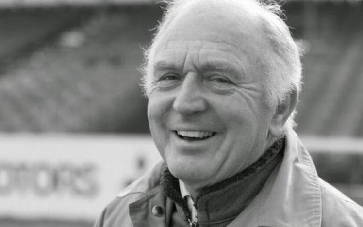 Black and white commemorative photo of Mike Tucker.