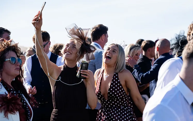 Image of 2 girls taking a selfie at Bath Racecourse