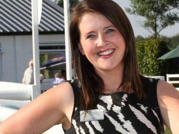 Jo Hall the executive director at Bath Racecourse posing for a photo.