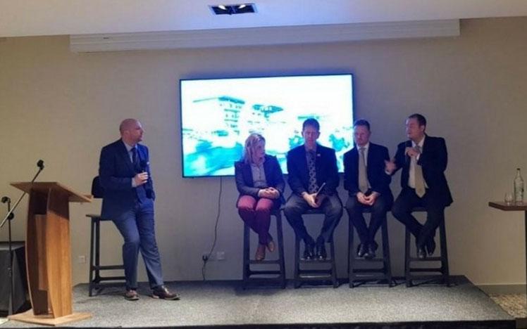 Panel of guests hosting a conference at Bath Racecourse at the start of the racing season.