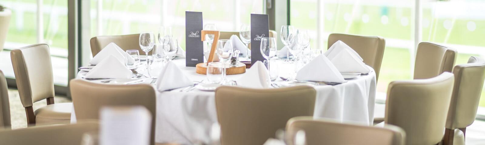 Hospitality table in one of the Bath Racecourse restaurants set up ready for guests.