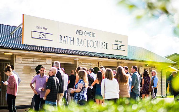 People queueing up to enter the Bath Racecourse.