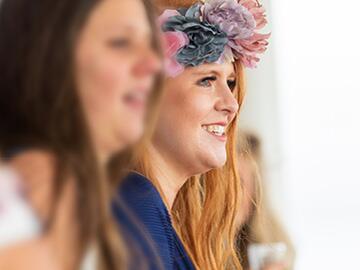 Ladies watching a race on ladies day at Bath Racecourse