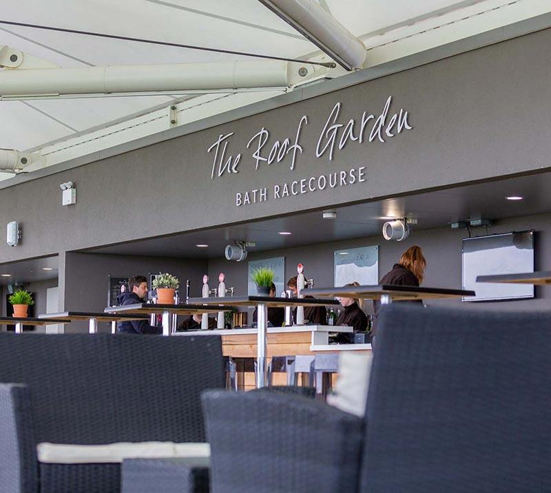 View of the bar counter in the Roof Garden bar at Bath Racecourse.