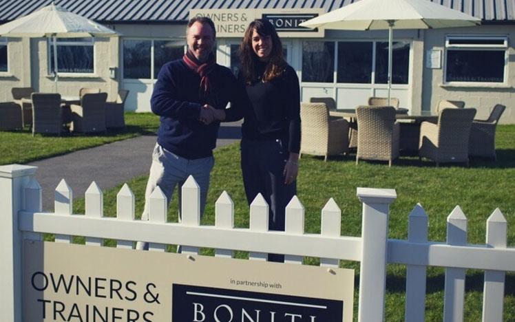 Representatives from Bath Racecourse team and Boniti posing for a photo in front of Owners & Trainers Suite.