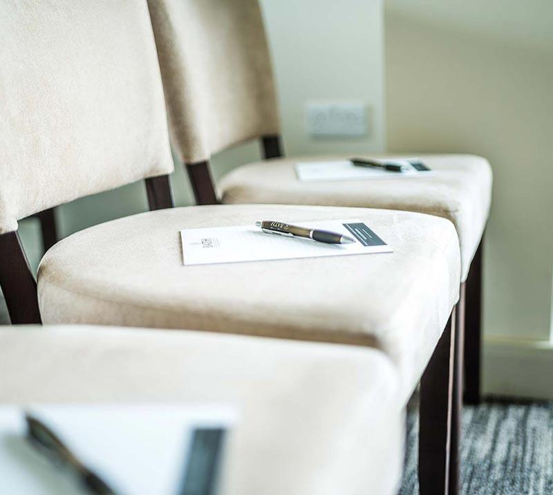 Close up of chairs in a meeting room.